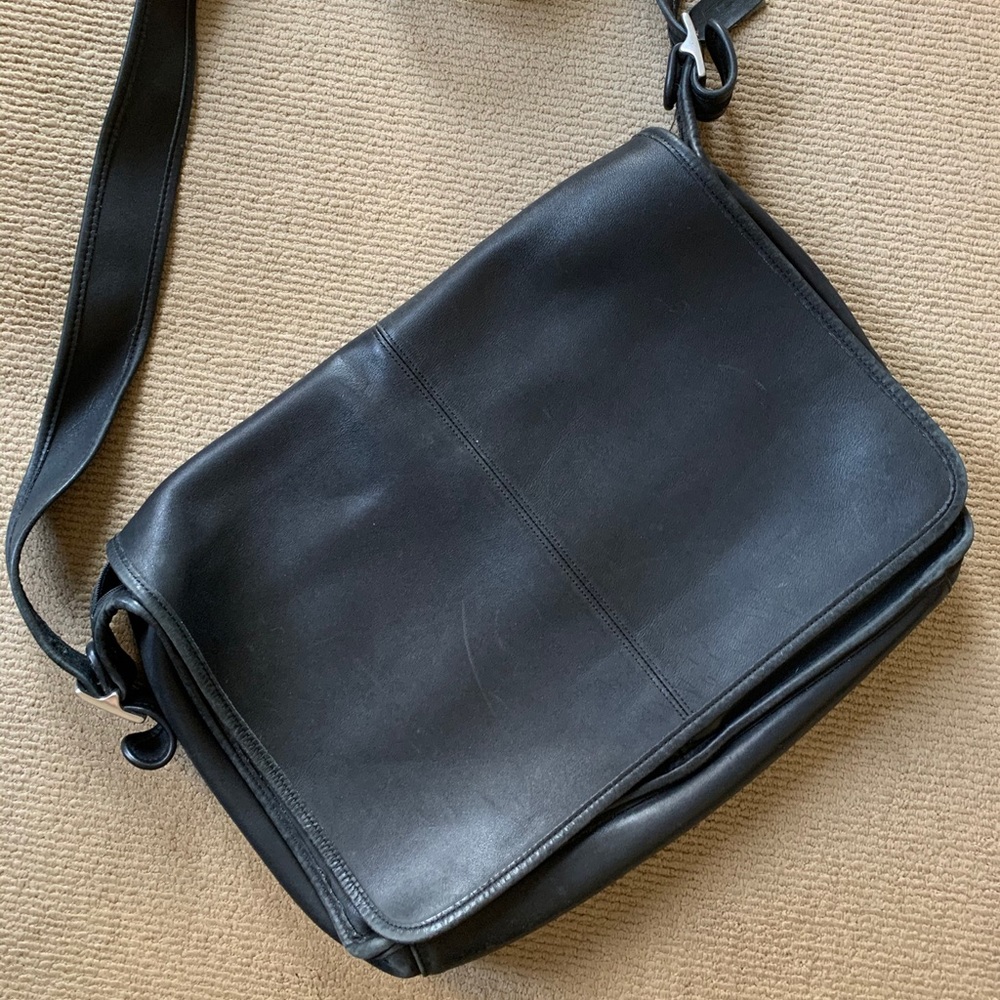 1990s “vintage” Coach black leather flap-over messenger bag